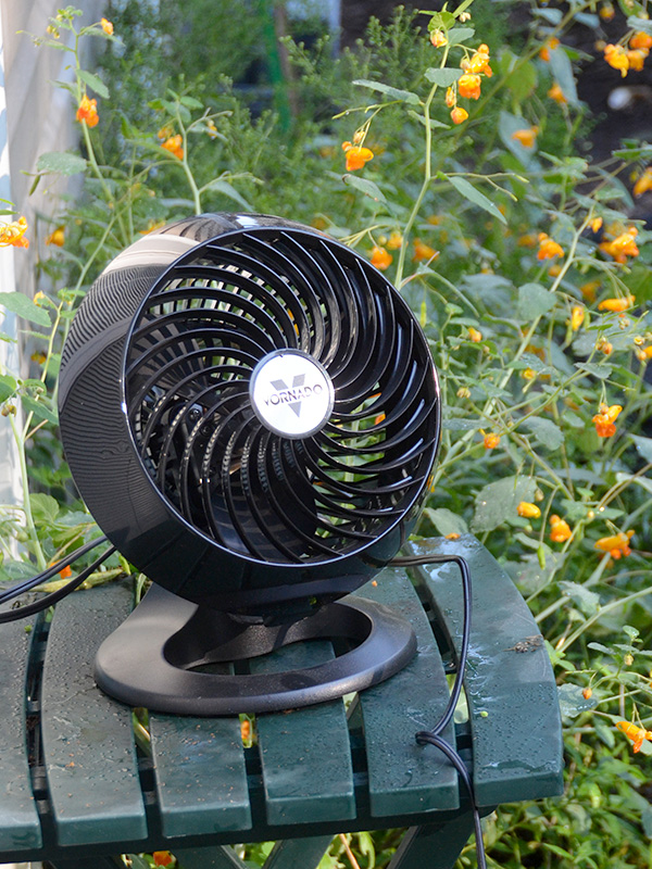Using a fan to blow away mosquitos
