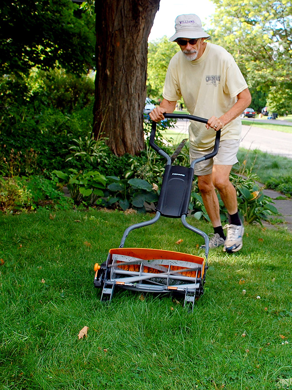 Using a hand mower